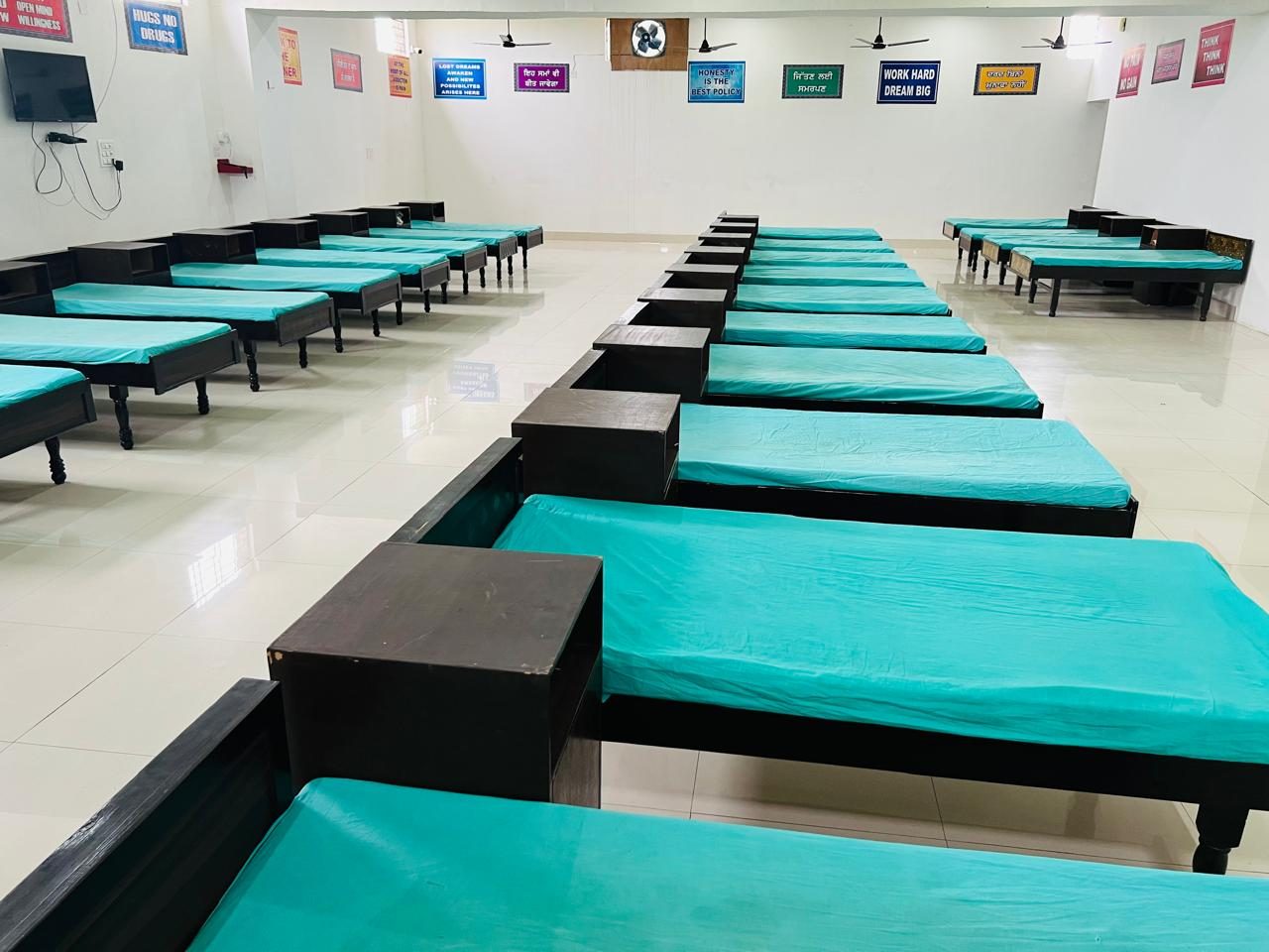New Life Rehab Center residential hall — Hugs No Drugs, Work Hard Dream Big