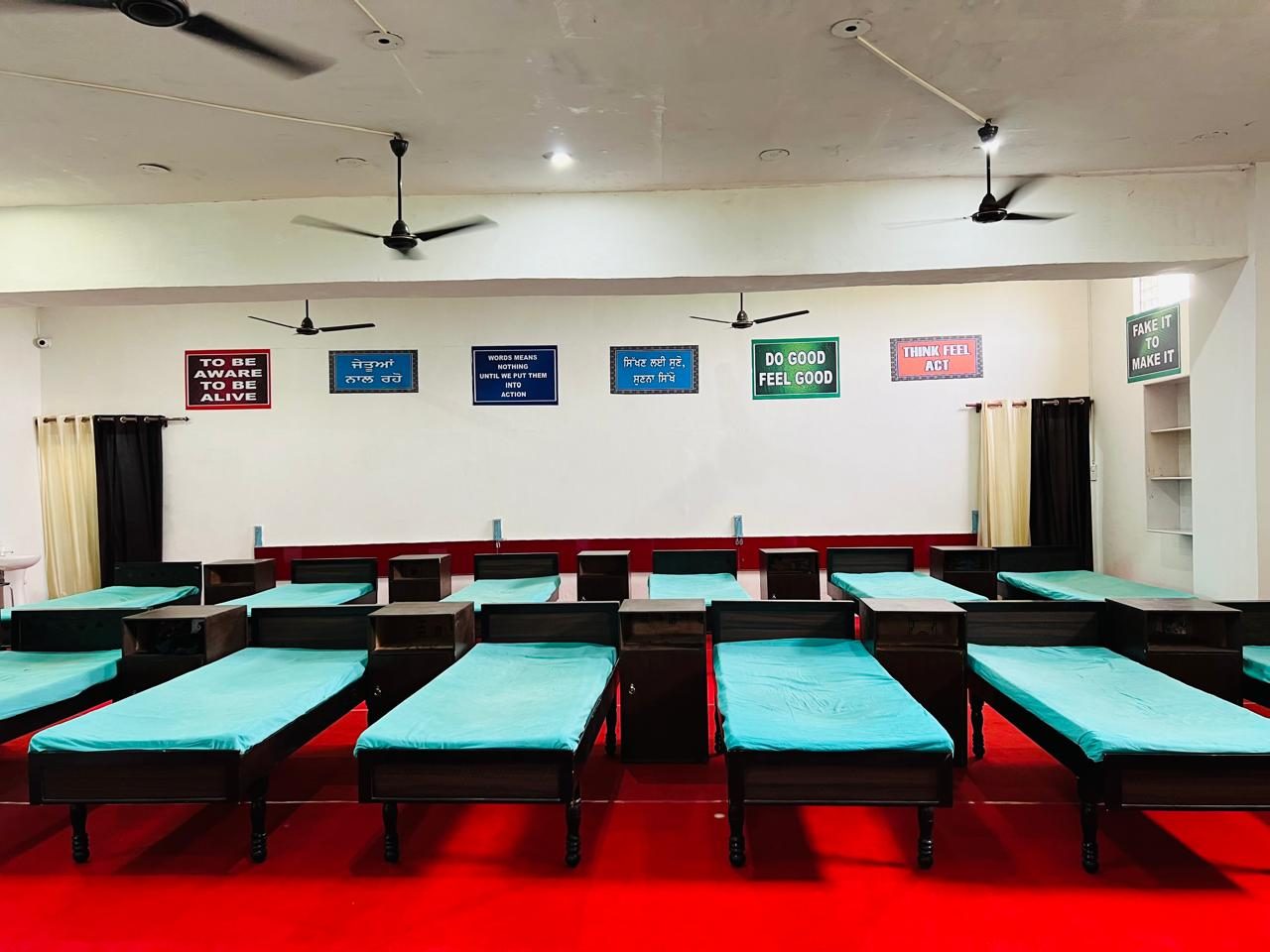 Recovery residential ward with motivational slogans in Punjabi
